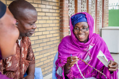 Aïcha Masanke, a community health worker at Maman Ansar, talks to a couple about family planning methods. Here, she demonstrates cycle beads. Maman Ansar, which means Warrior Women, worked with more than 40 Imams across the Democratic Republic of the Congo to develop a declaration of commitment to promote family planning. Aïcha Masanke, a community health worker at Maman Ansar, talks to a couple about family planning methods. Here, she demonstrates cycle beads. Maman Ansar, which means Warrior Women, worked with more than 40 Imams across the Democratic Republic of the Congo to develop a declaration of commitment to promote family planning.