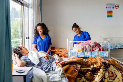 Nigist Wondimu (left) delivered her daughter at Marie Stopes International’s Arada Maternal Child Health Center in Addis Ababa, Ethiopia. Although she’s pleased with the service at the center, she has to take four buses to get there. She may try to come back for a follow-up appointment, but will look for a government facility closer to her neighborhood. Nigist Wondimu (left) delivered her daughter at Marie Stopes International’s Arada Maternal Child Health Center in Addis Ababa, Ethiopia. Although she’s pleased with the service at the center, she has to take four buses to get there. She may try to come back for a follow-up appointment, but will look for a government facility closer to her neighborhood.
