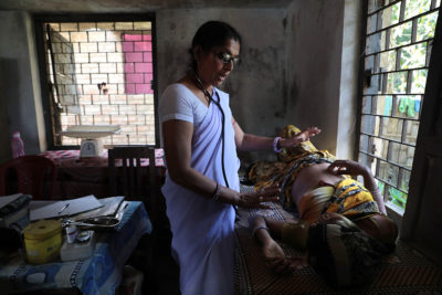 Kamini Kumari, an Auxillary Midwife Nurse, provides medical care to women at a rural health center. Women's equal participation in governance and leadership roles is a step towards building stronger communities and improving reproductive health services at village, block, and district levels. The Center for Catalyzing Change (C3) is strengthening the voice, participation, leadership and influence of elected women representatives to achieve these goals. —Muzaffarpur District, Bihar, India Kamini Kumari, an Auxillary Midwife Nurse, provides medical care to women at a rural health center. Women's equal participation in governance and leadership roles is a step towards building stronger communities and improving reproductive health services at village, block, and district levels. The Center for Catalyzing Change (C3) is strengthening the voice, participation, leadership and influence of elected women representatives to achieve these goals. —Muzaffarpur District, Bihar, India